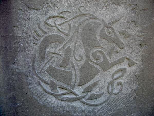 Carved Celtic knotwork horse medallion