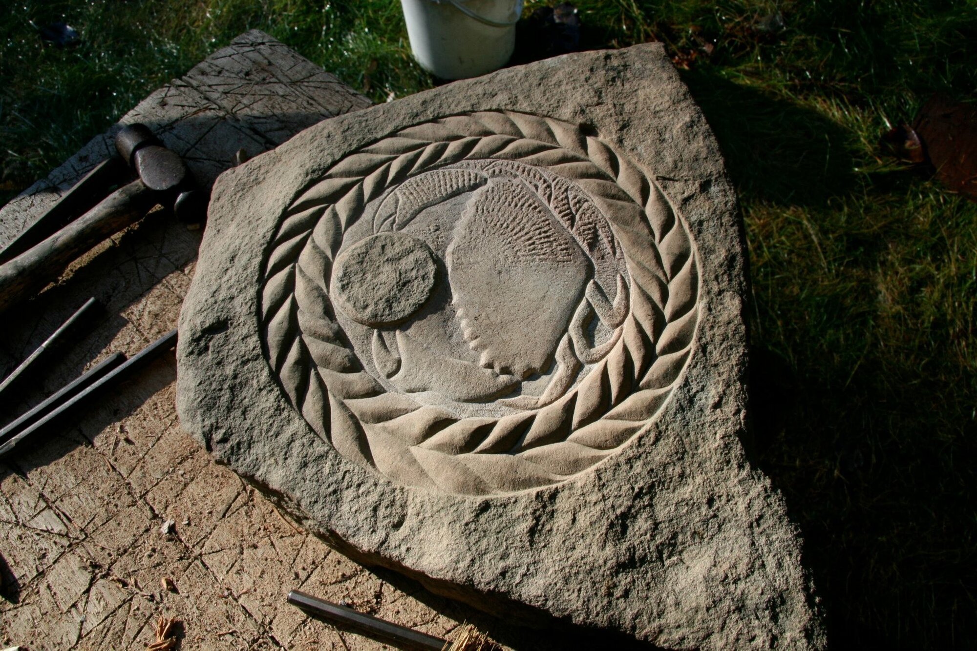 Carved ram head medallion, in progress