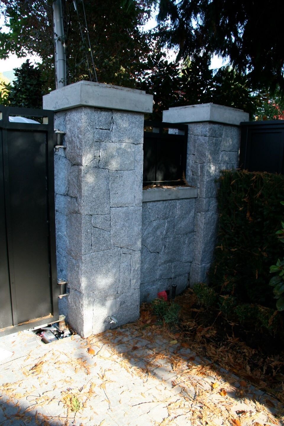 Matching granite mailbox pillars