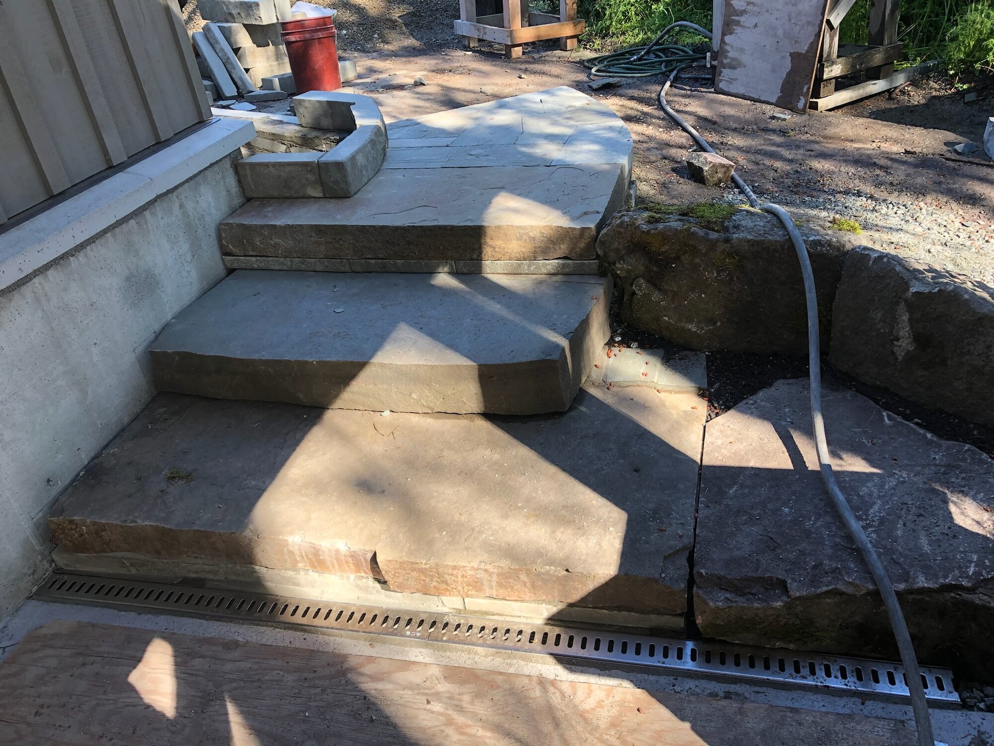 Flagstone steps beside a drainage channel
