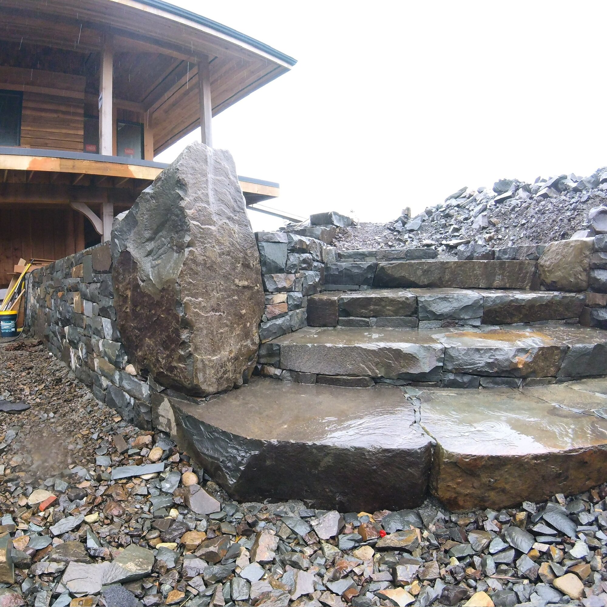Wet slate steps at a new home under construction