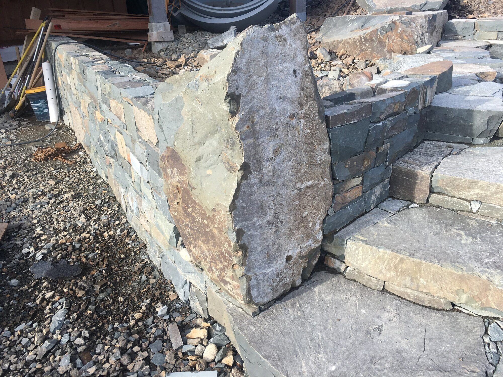 Corner stone pillar and wall with steps