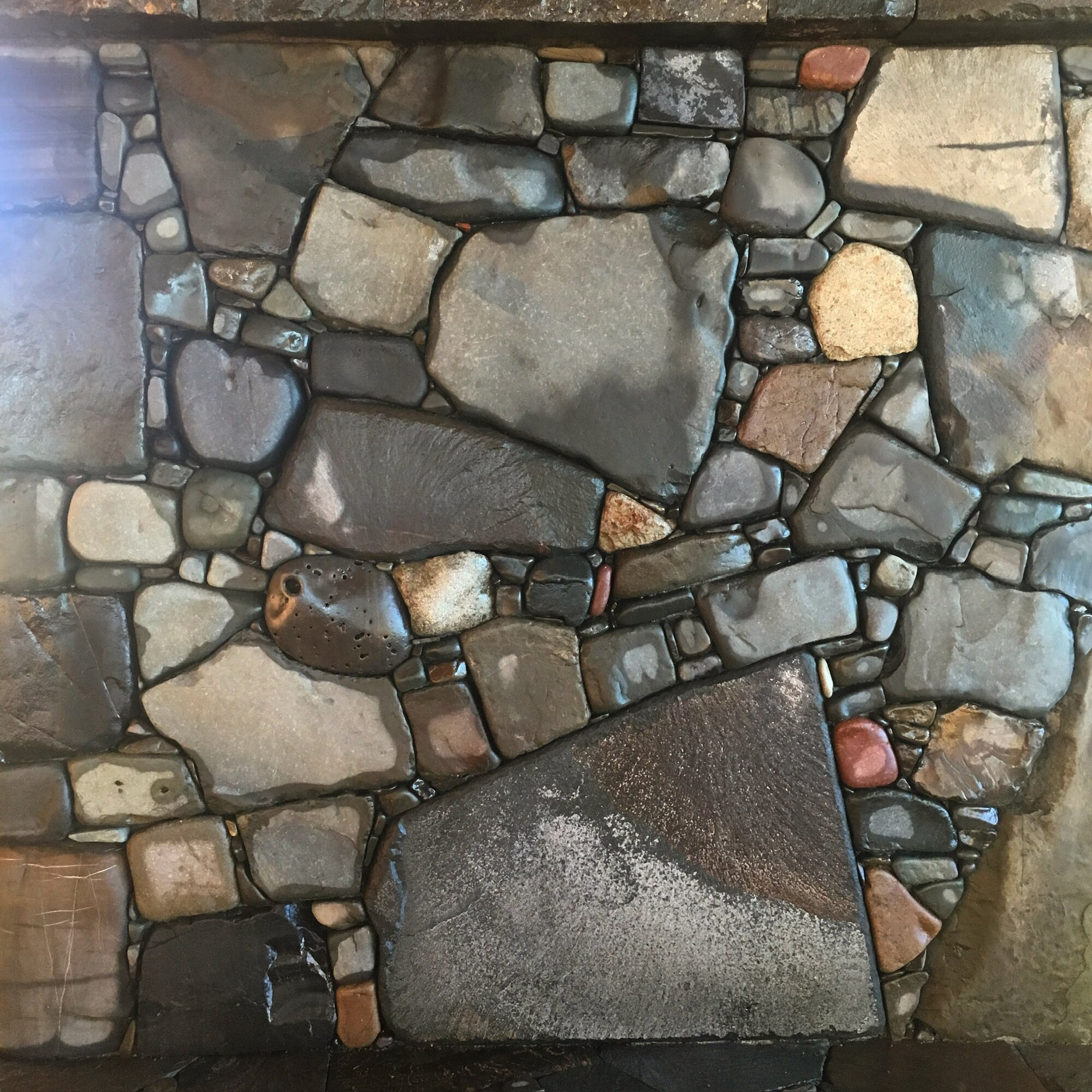 Pebble mosaic wall panel detail